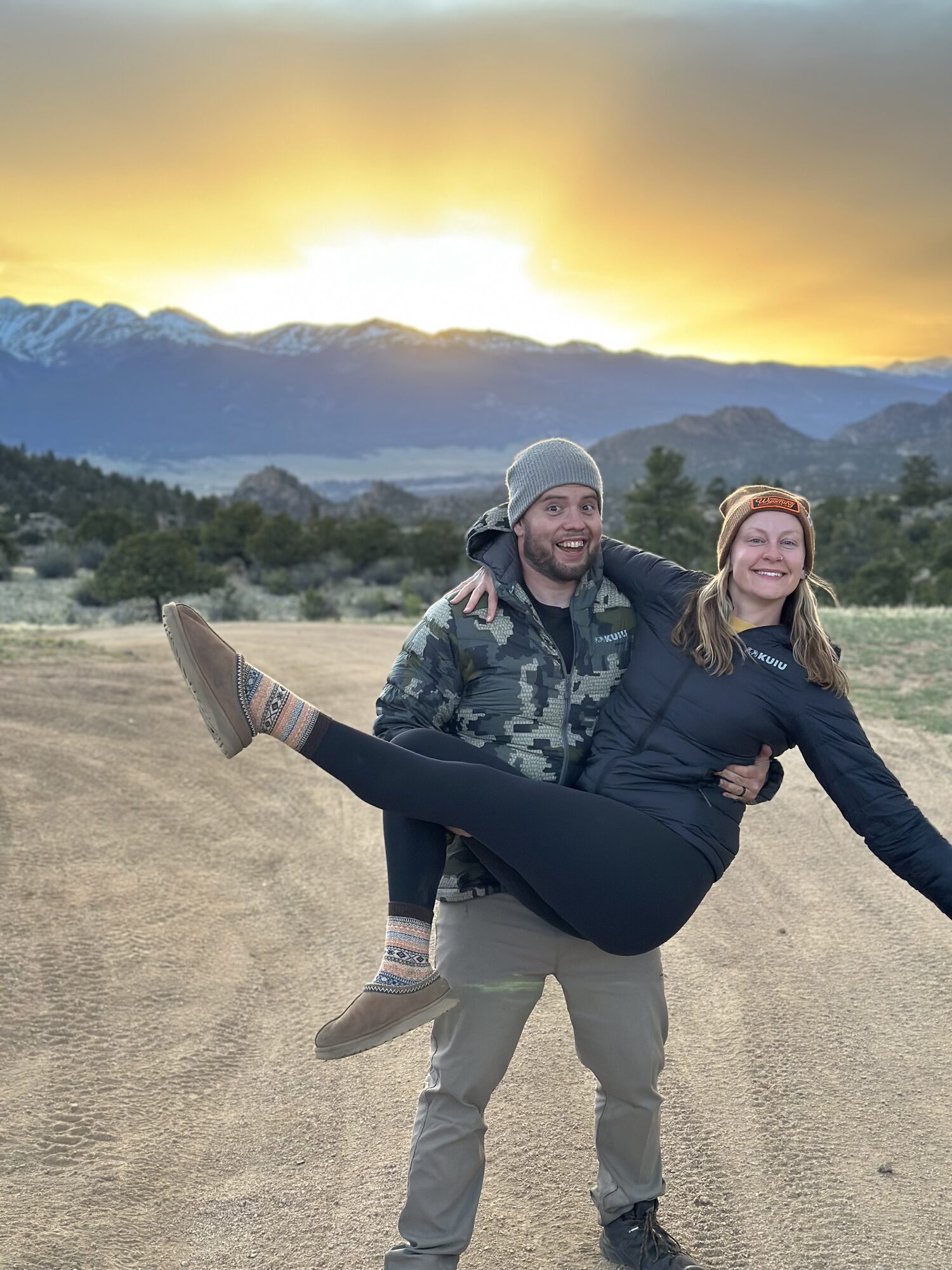 Dallan and Lizzy Whistance at sunset in the Colorado mountains