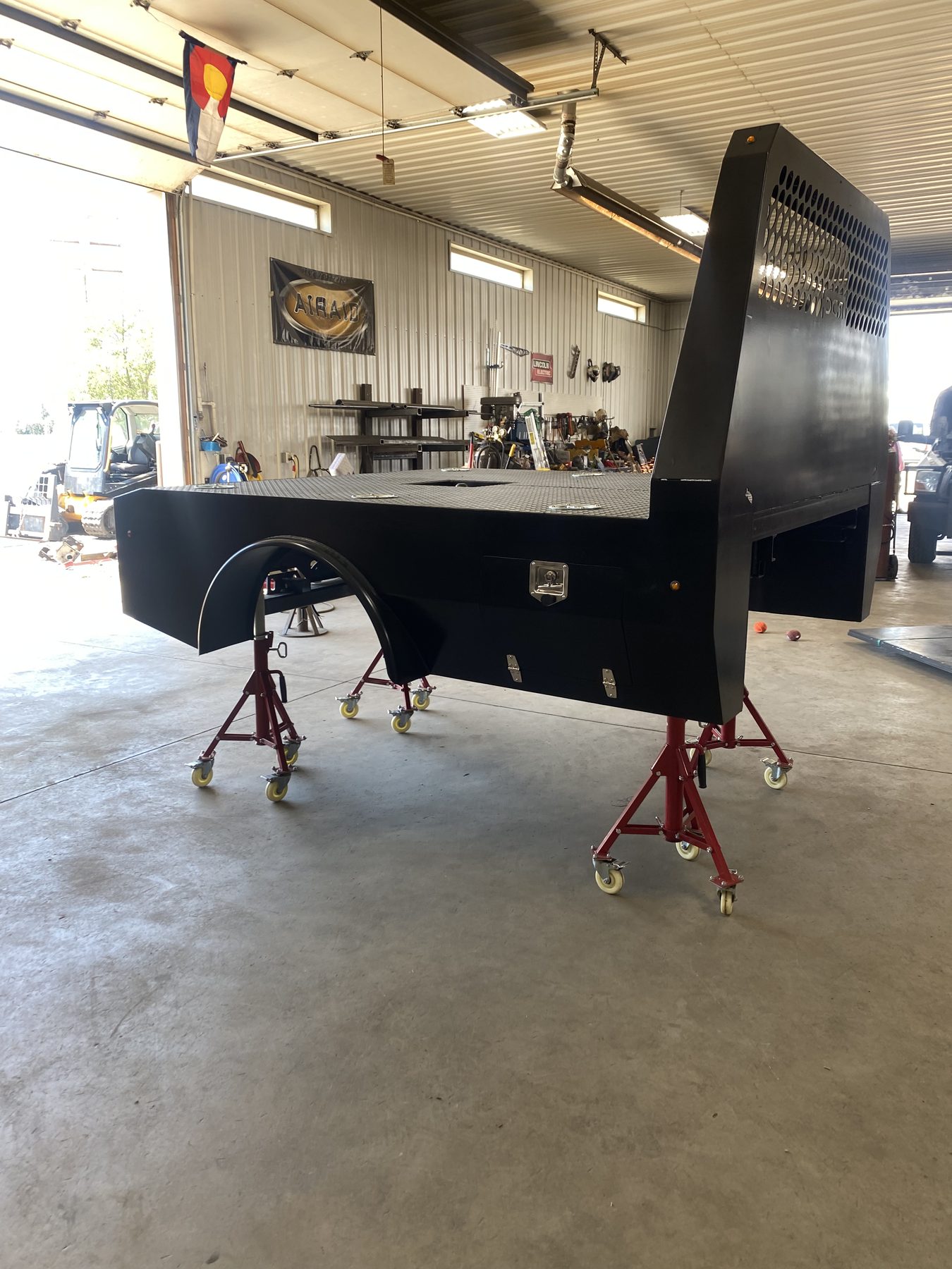 Powder coated finished custom flatbed delivered by ArcWest Fabrication